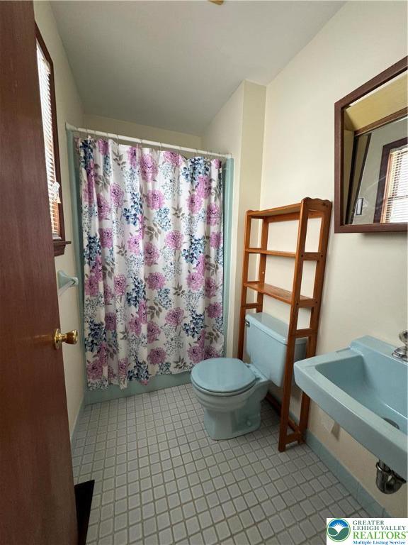 1207 Kressler Road Allentown, PA 18103 - Photo 16 of 27 a view of bathroom with a toilet and a sink