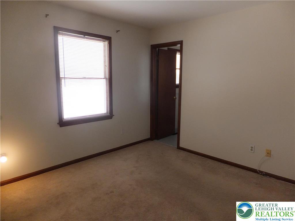 1207 Kressler Road Allentown, PA 18103 - Photo 22 of 27 an empty room with a window