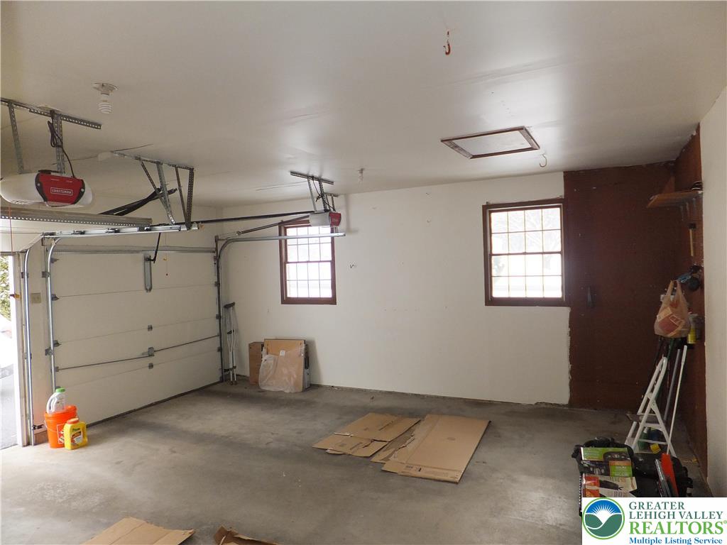 1207 Kressler Road Allentown, PA 18103 - Photo 23 of 27 a room with gym equipment and a window