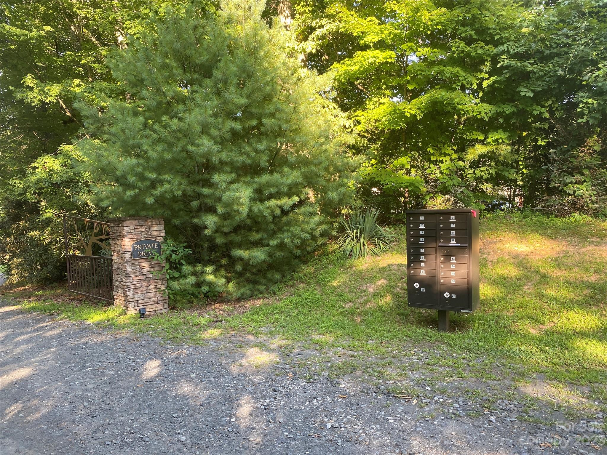 Lot # Pack Drive, Unit 3 Spruce Pine, NC 28777 - Photo 4 of 7 a backyard of a house with entertaining space