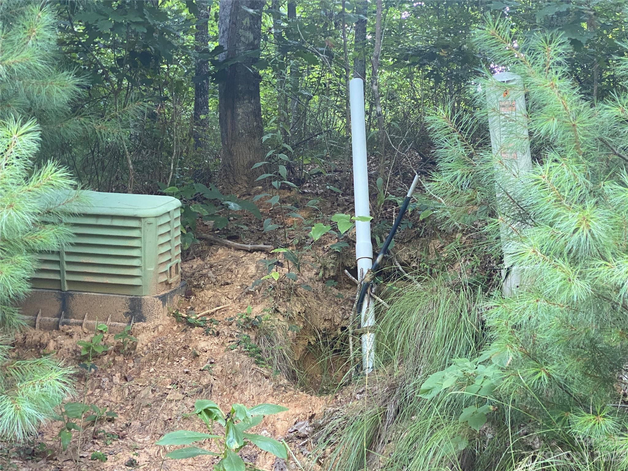 Lot # Pack Drive, Unit 3 Spruce Pine, NC 28777 - Photo 6 of 7 a backyard of a house with lots of green space