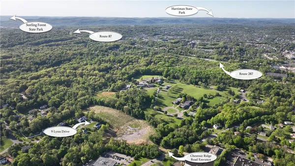 a view of a swimming pool with seating area