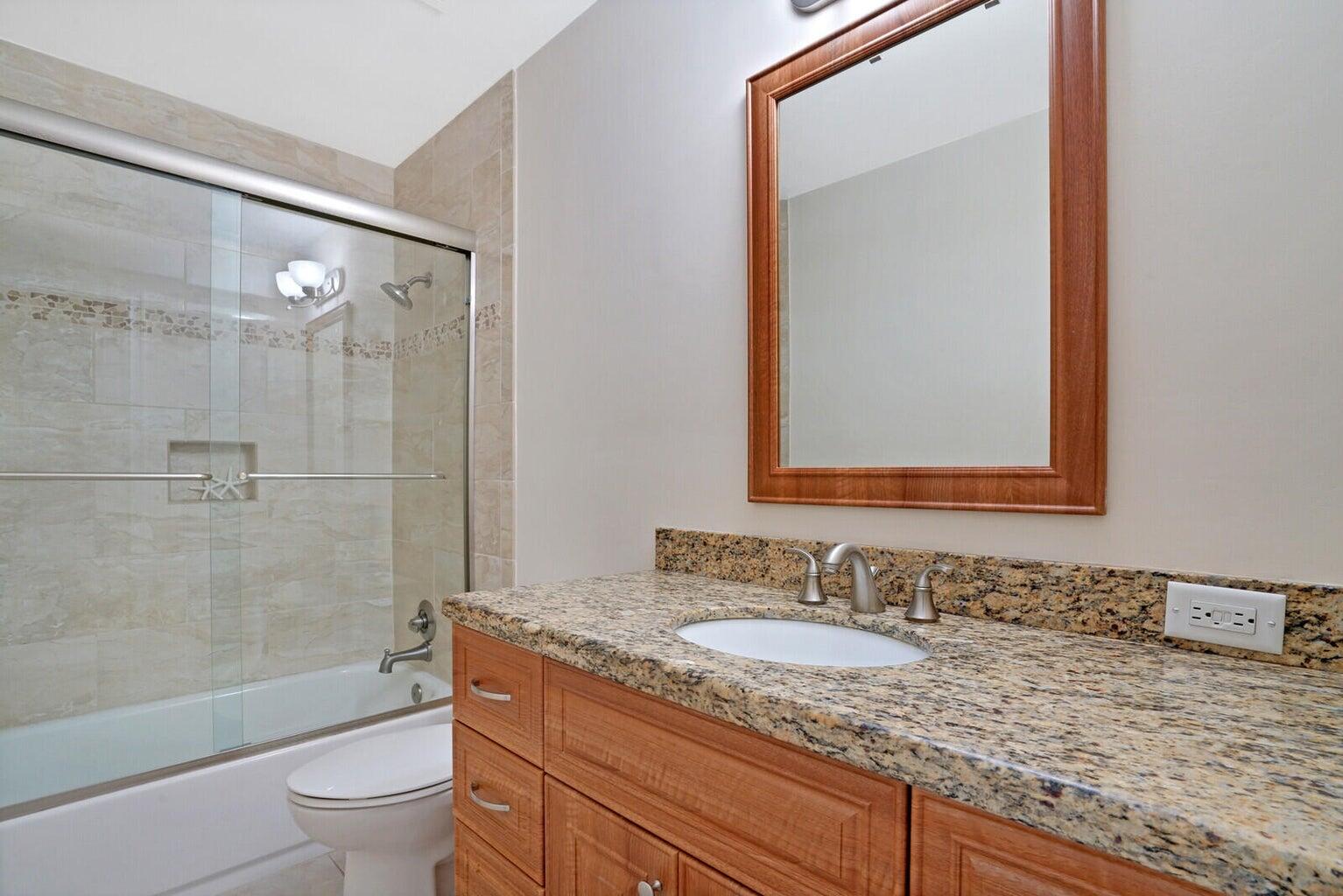 1104 Northeast 4th Drive Deerfield Beach, FL 33441 - Photo 20 of 37 Primary bath