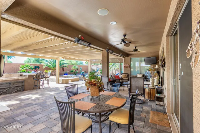 an aerial view of a residential apartment building with a yard