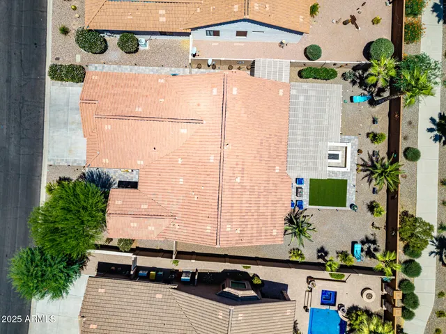 a view of a swimming pool with a patio