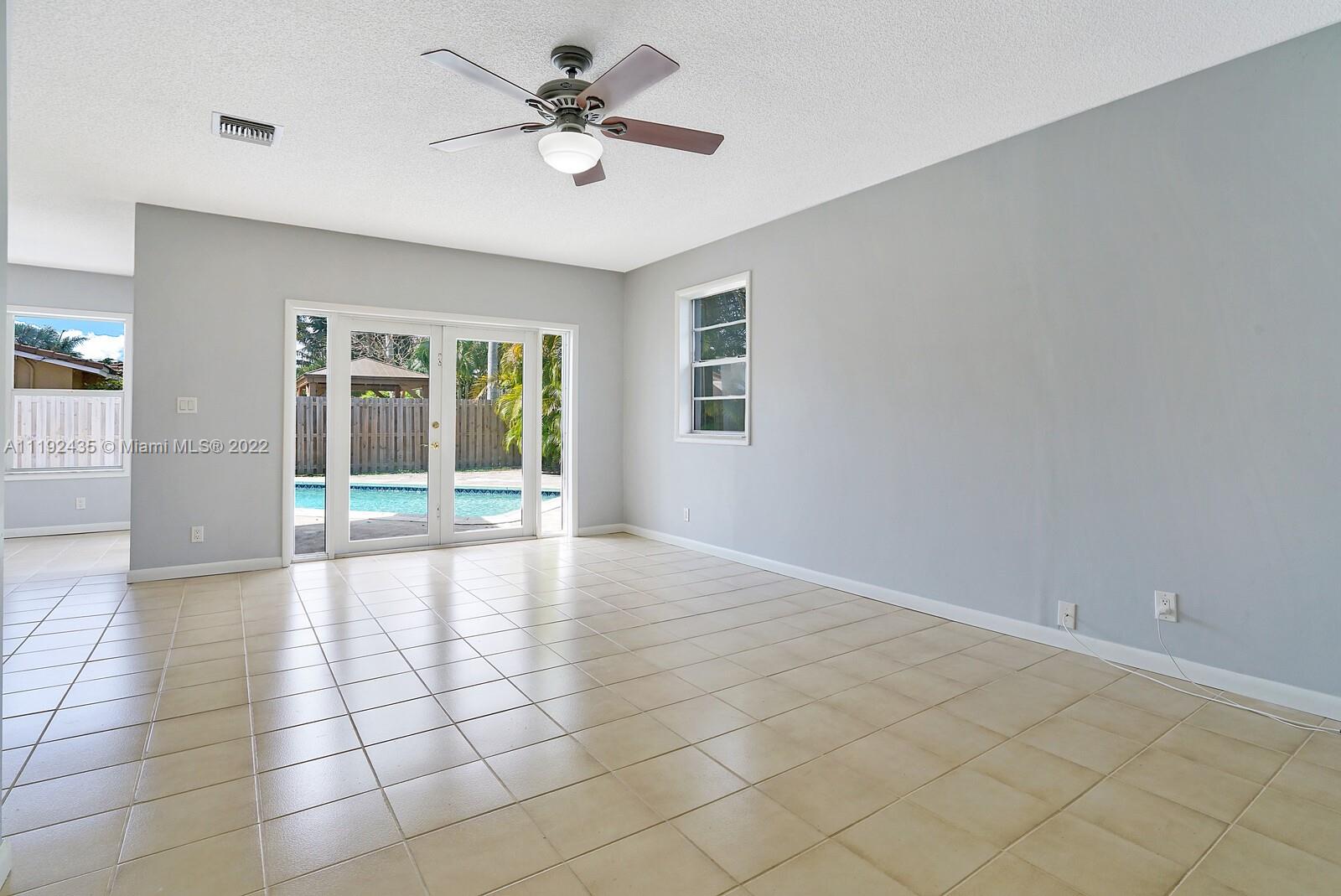 5211 Northeast 26th Avenue Lighthouse Point, FL 33064 - Photo 26 of 43 a view of an empty room with a window