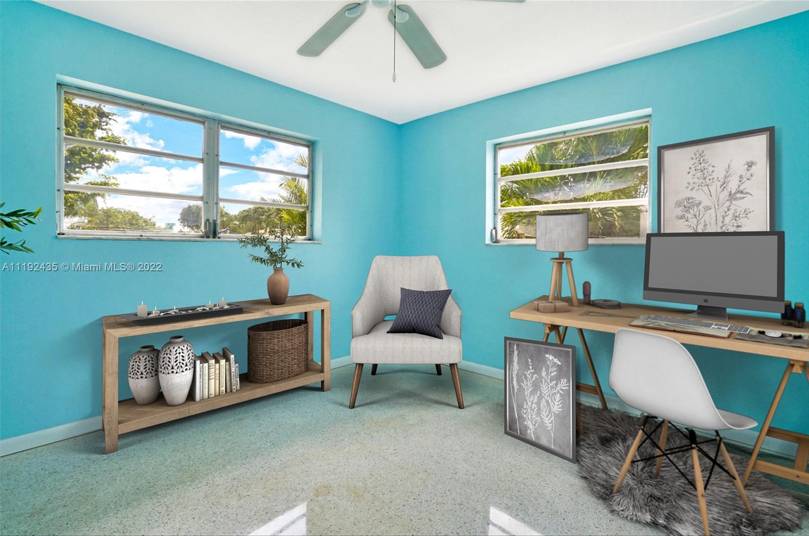 5211 Northeast 26th Avenue Lighthouse Point, FL 33064 - Photo 33 of 43 a room with furniture and a window