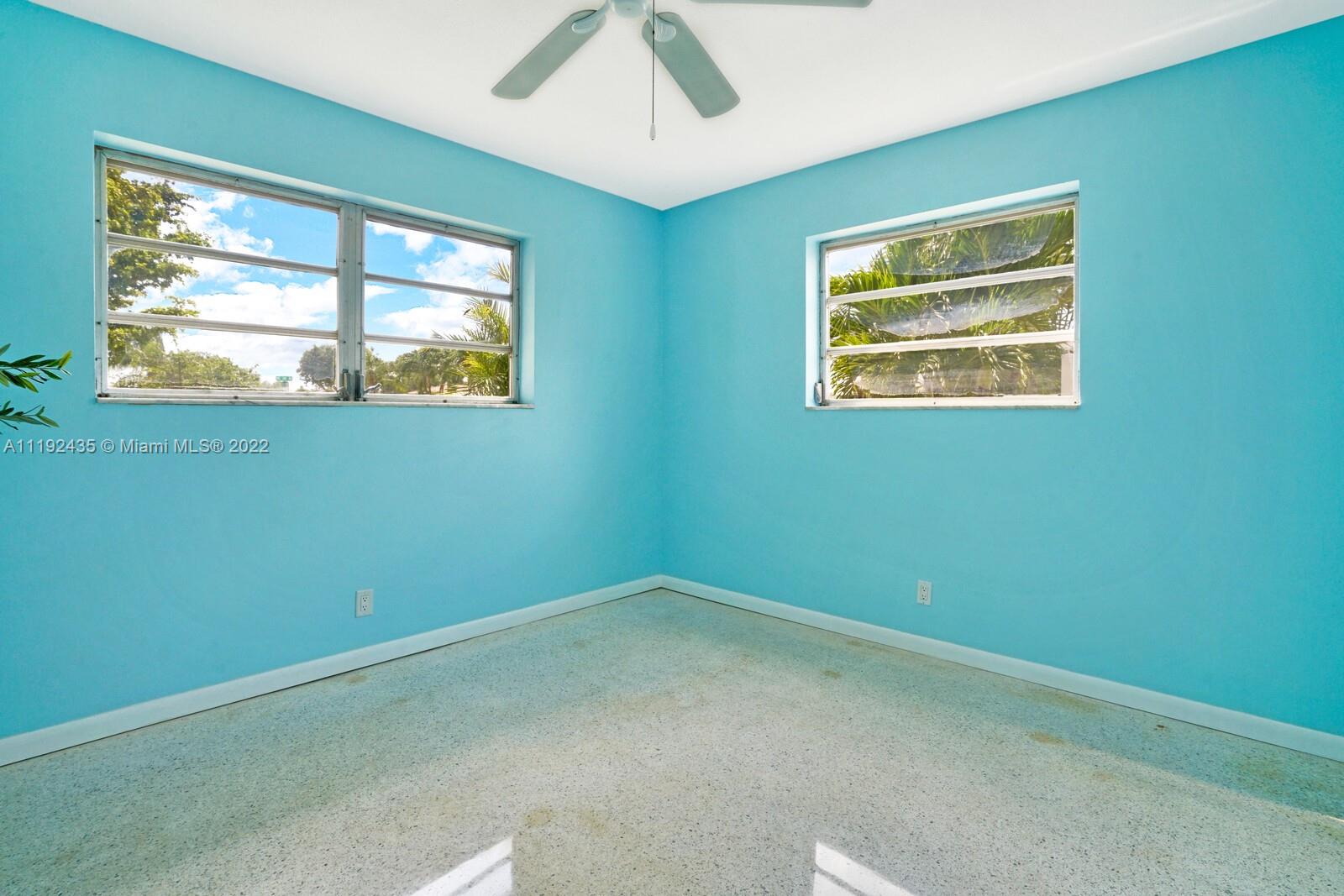 5211 Northeast 26th Avenue Lighthouse Point, FL 33064 - Photo 34 of 43 an empty room with window