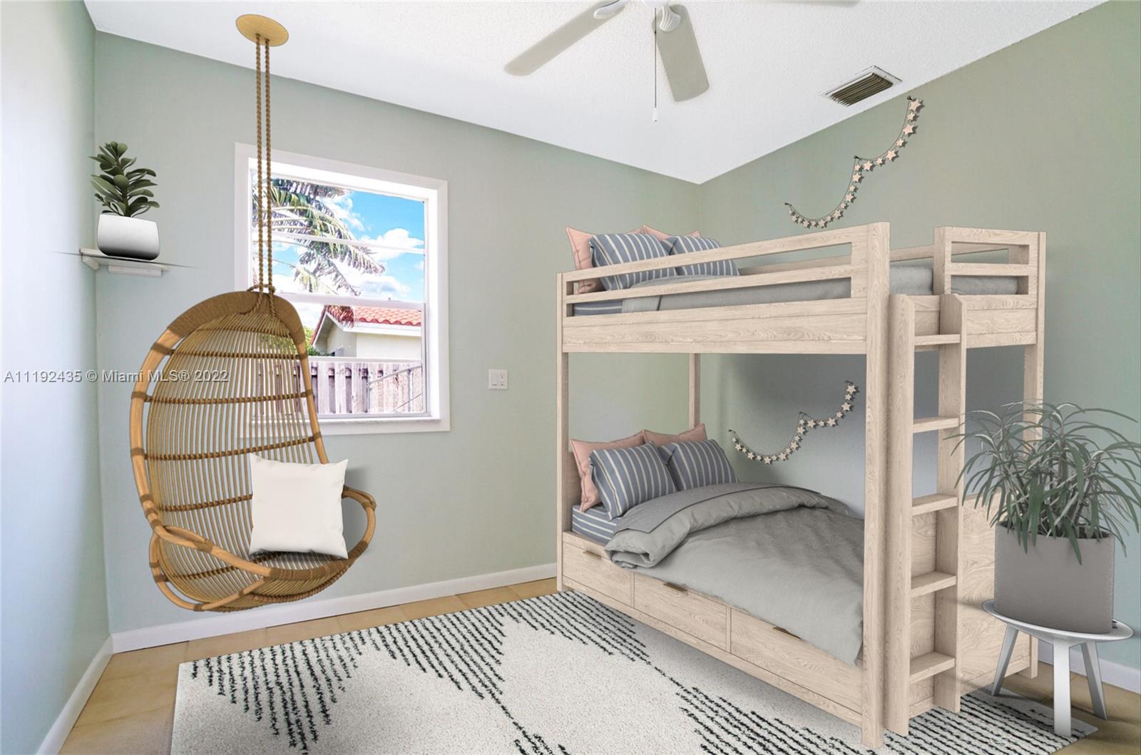 5211 Northeast 26th Avenue Lighthouse Point, FL 33064 - Photo 37 of 43 a bedroom with a bed and a window