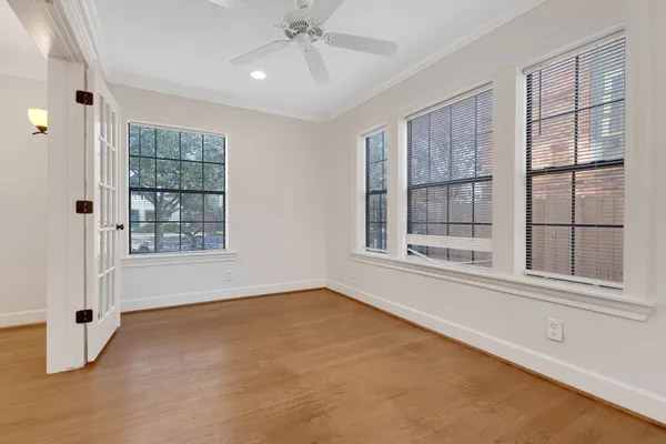 a view of an empty room with a window
