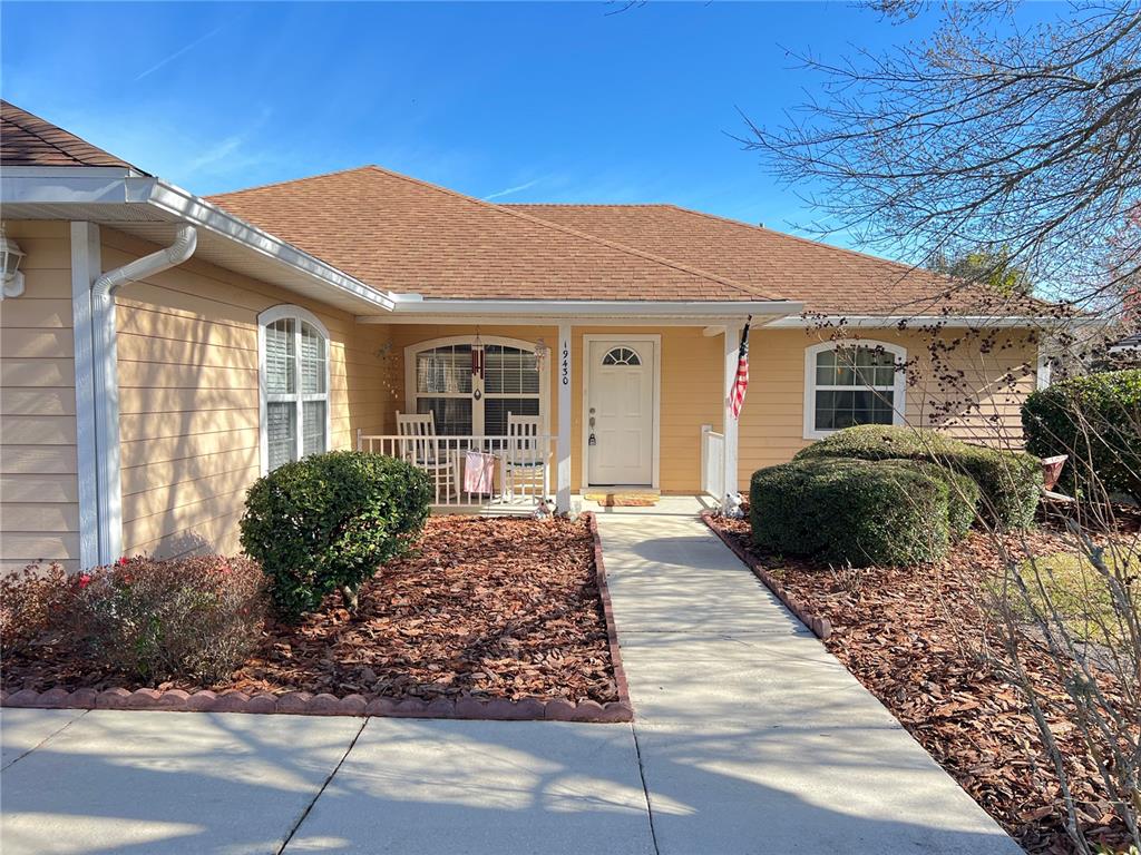 19430 Northwest 164th Road High Springs, FL 32643 - Photo 21 of 24 a front view of a house with garden