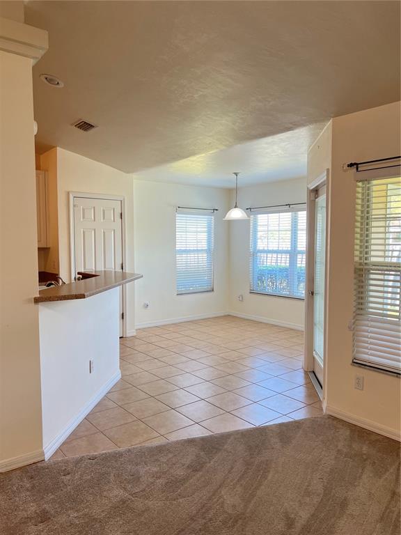 19430 Northwest 164th Road High Springs, FL 32643 - Photo 3 of 24 a view of an empty room and window and wooden floor