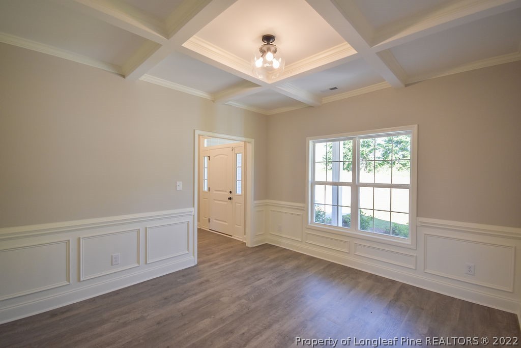 668 Townsend Road Raeford, NC 28376 - Photo 3 of 14 wooden floor in an empty room with a window