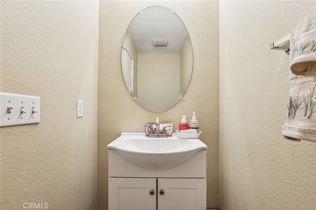 17550 Buttonwood Lane Carson, CA 90746 - Photo 15 of 43 a bathroom with a sink and a mirror
