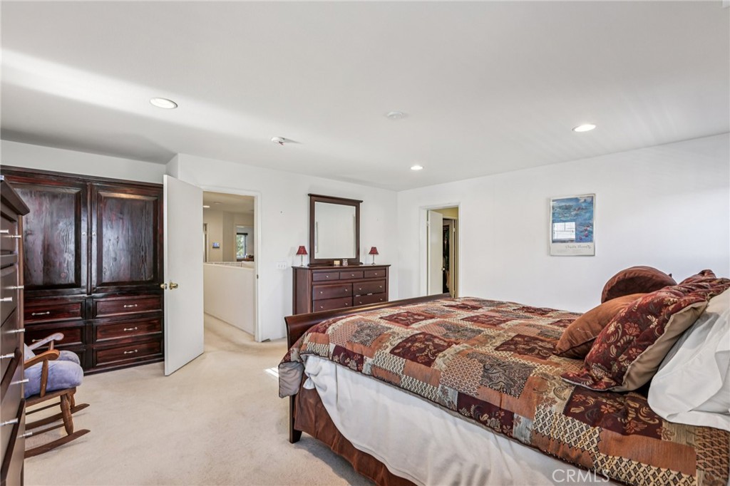 17550 Buttonwood Lane Carson, CA 90746 - Photo 20 of 43 a bedroom with a bed and a view of closet