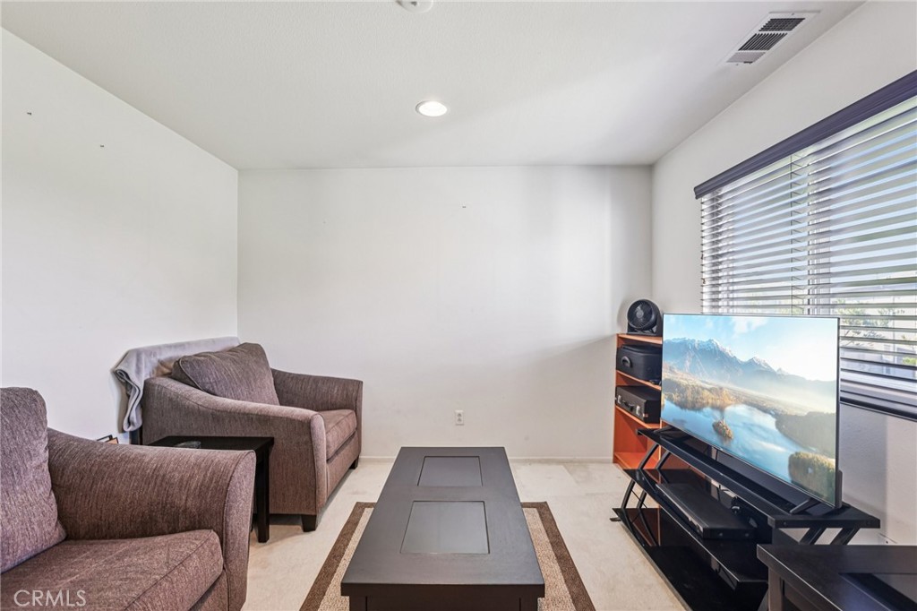 17550 Buttonwood Lane Carson, CA 90746 - Photo 23 of 43 a room with furniture and a window