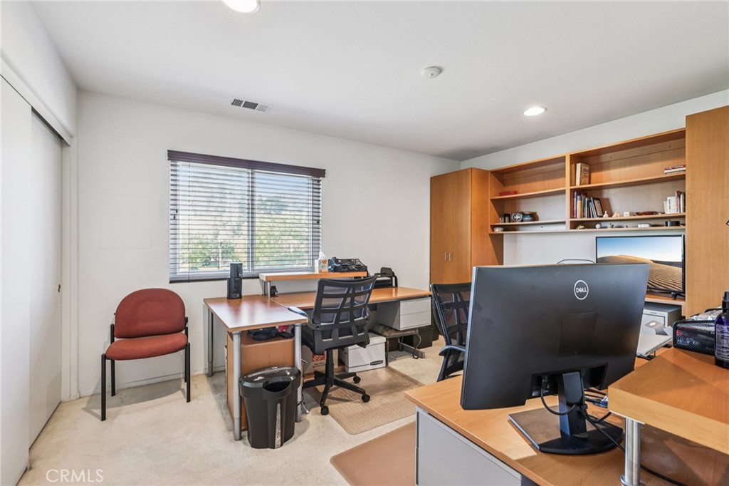 17550 Buttonwood Lane Carson, CA 90746 - Photo 26 of 43 a view of a workspace with furniture and a window