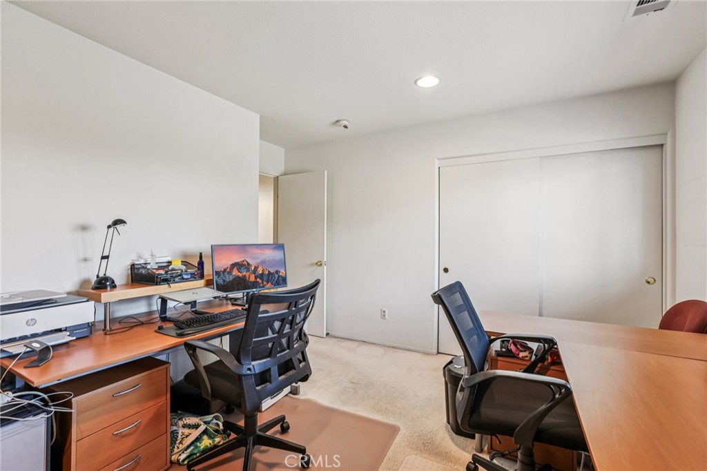 17550 Buttonwood Lane Carson, CA 90746 - Photo 29 of 43 a view of a workspace with furniture and a window