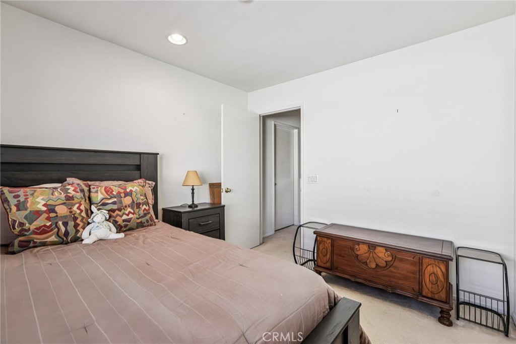 17550 Buttonwood Lane Carson, CA 90746 - Photo 31 of 43 a bedroom with a bed and a dresser