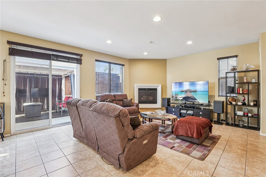 17550 Buttonwood Lane Carson, CA 90746 - Photo 4 of 43 a living room with furniture and a flat screen tv