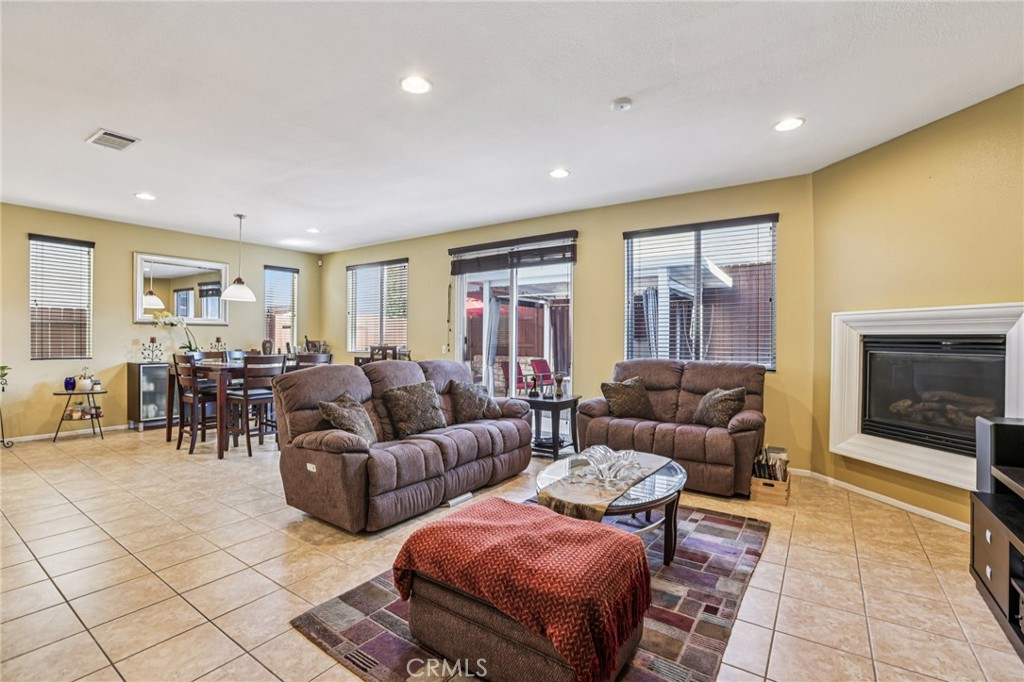 17550 Buttonwood Lane Carson, CA 90746 - Photo 5 of 43 a living room with furniture and a fireplace