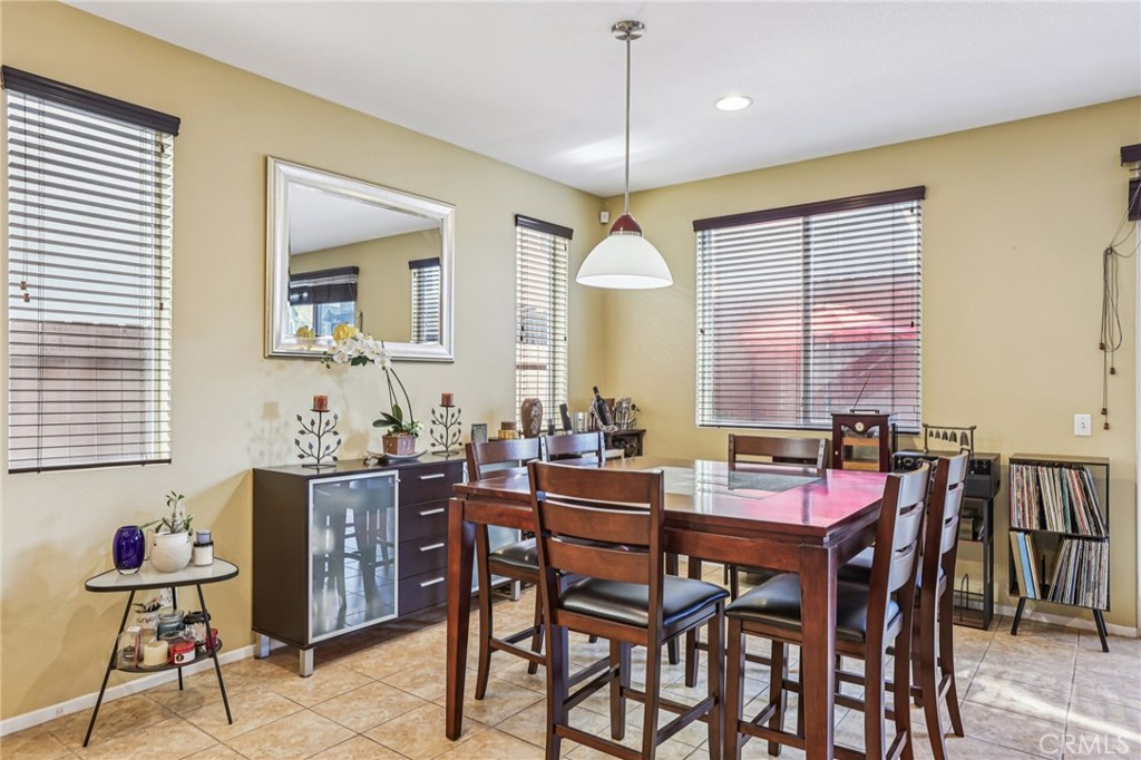 17550 Buttonwood Lane Carson, CA 90746 - Photo 8 of 43 a view of a dining room with furniture and window