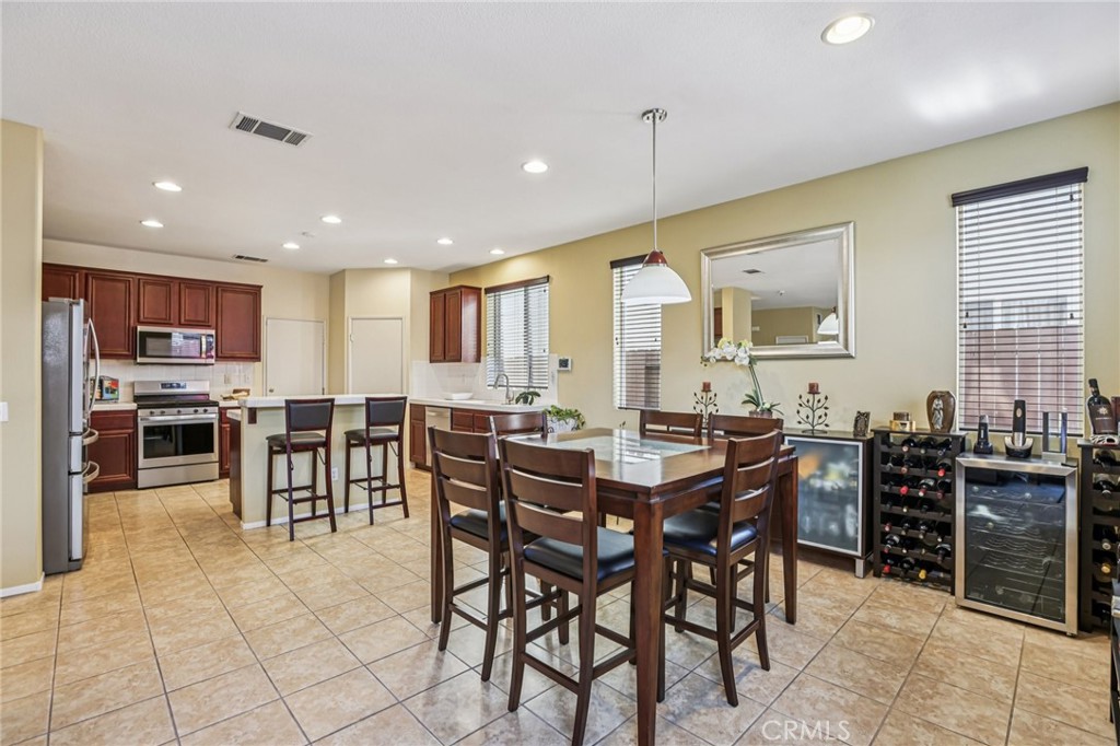 17550 Buttonwood Lane Carson, CA 90746 - Photo 9 of 43 a view of a dining area with furniture