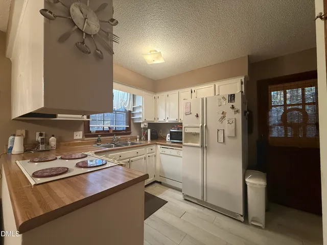 $325,000 | 303 Winding Brook Drive, Garner, NC 27529