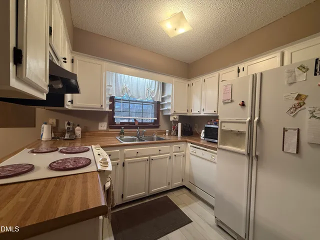 $325,000 | 303 Winding Brook Drive, Garner, NC 27529