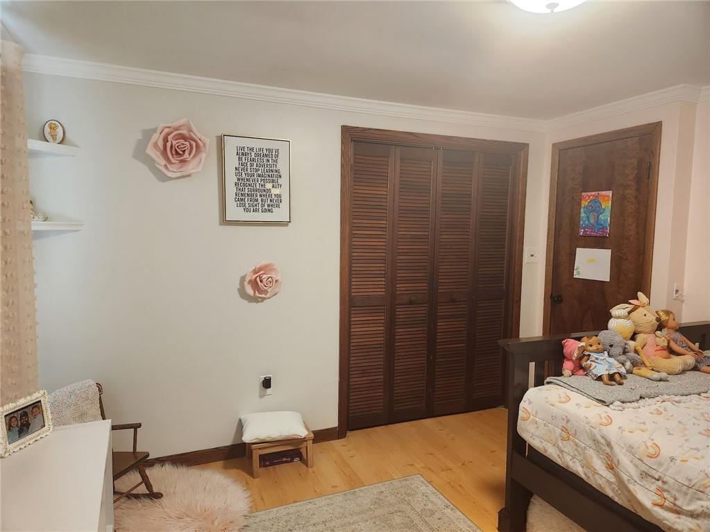 268 Old Plank Road Butler, PA 16002 - Photo 19 of 41 a bedroom with a bed and a table