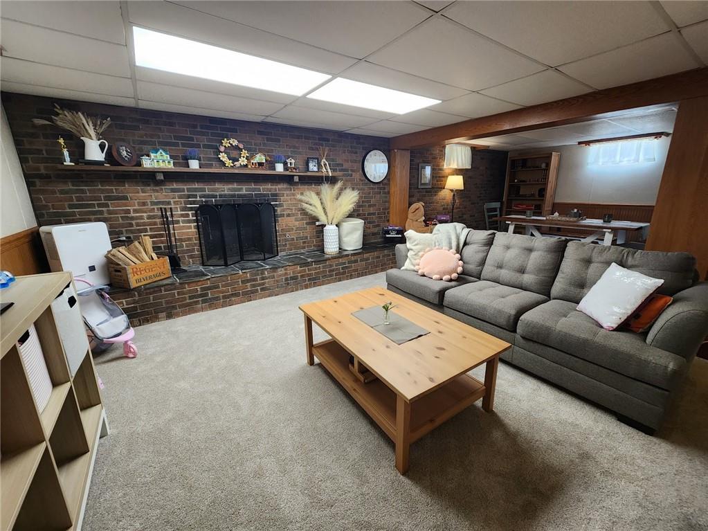 268 Old Plank Road Butler, PA 16002 - Photo 29 of 41 a living room with furniture and a fireplace