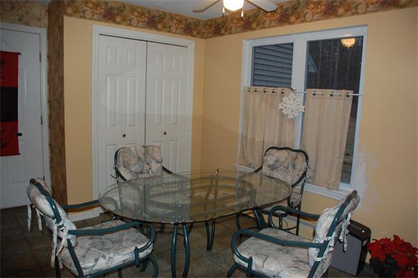 11 Longley Road, Unit G1 Shirley, MA 01464 - Photo 4 of 12 a view of a room that has a table and chairs