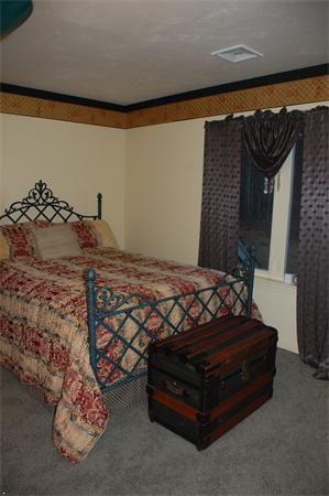 11 Longley Road, Unit G1 Shirley, MA 01464 - Photo 8 of 12 a bed sitting in a room next to a window