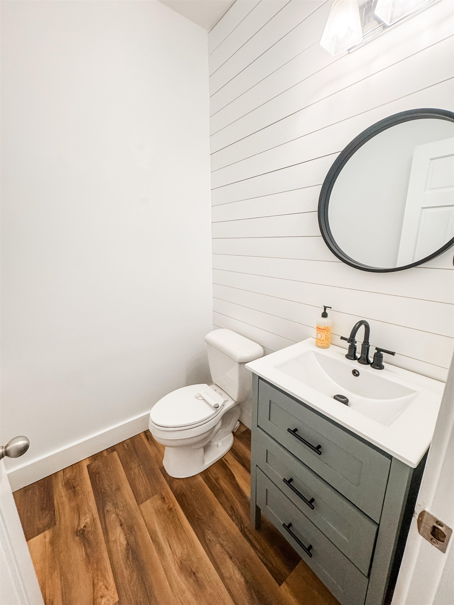 705 Cotham Drive Collierville, TN 38017 - Photo 12 of 22 a bathroom with a sink and a mirror