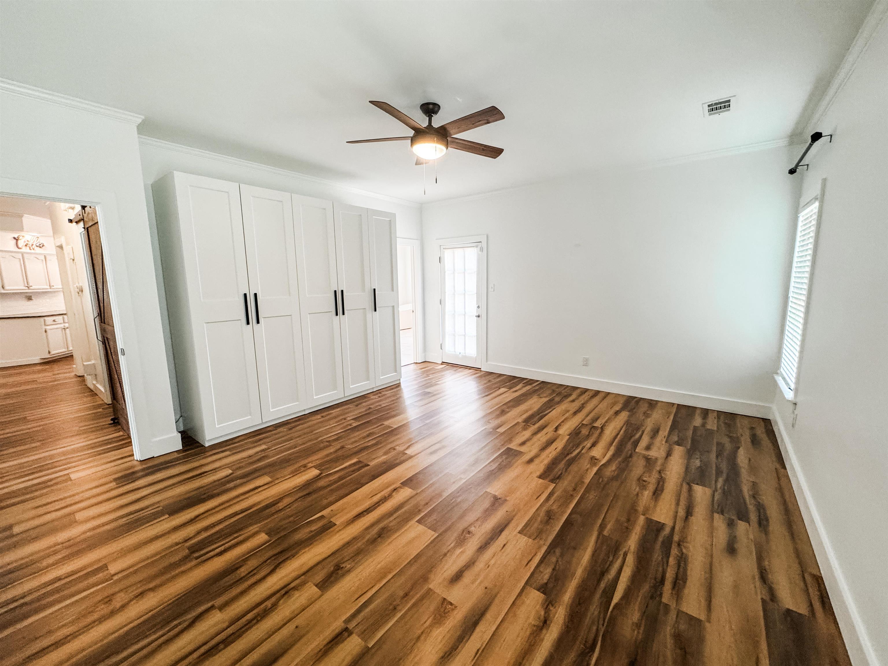 705 Cotham Drive Collierville, TN 38017 - Photo 14 of 22 a view of wooden floor in an empty room