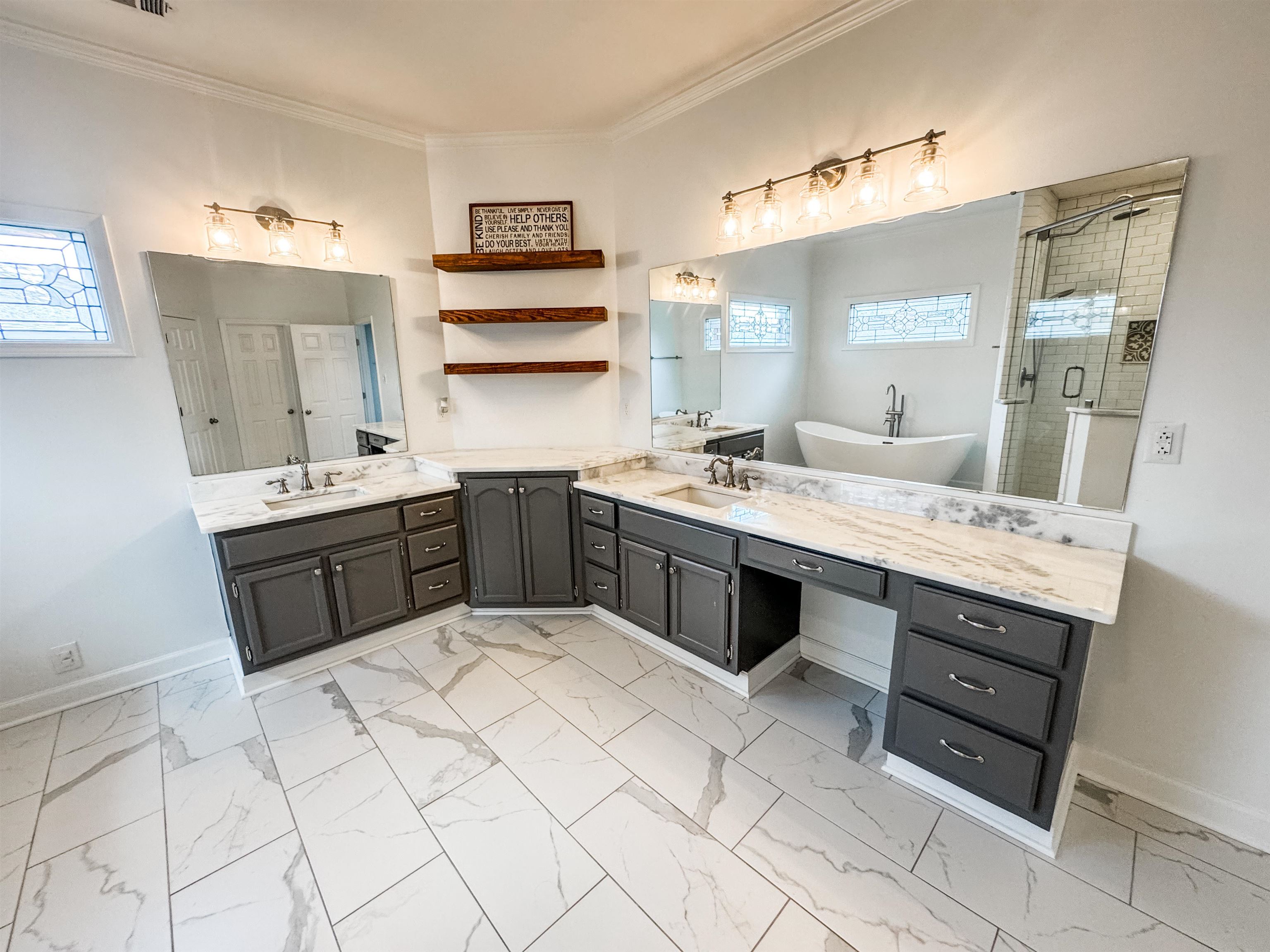 705 Cotham Drive Collierville, TN 38017 - Photo 16 of 22 a kitchen with a sink window and cabinets