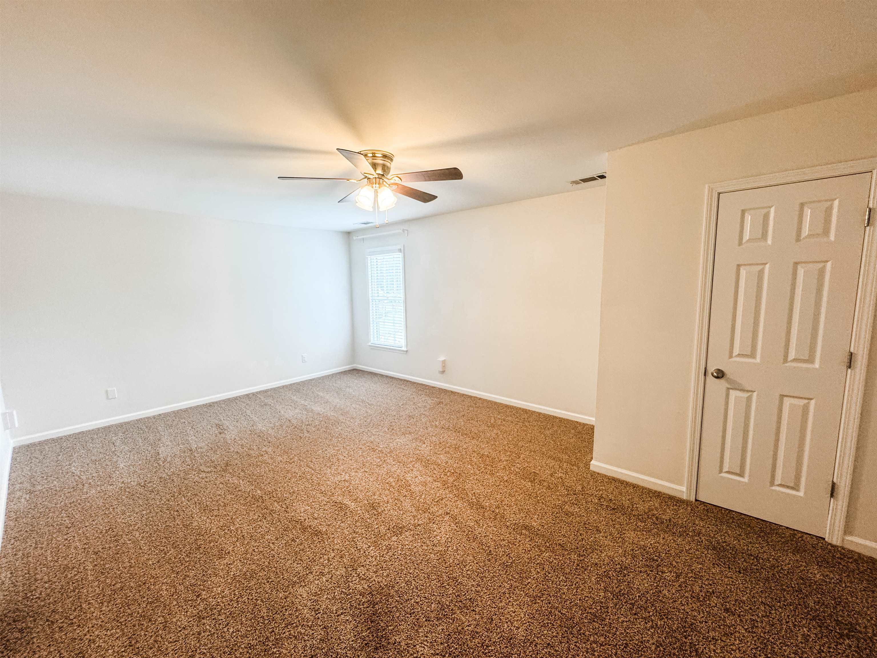 705 Cotham Drive Collierville, TN 38017 - Photo 20 of 22 a view of an empty room with a window