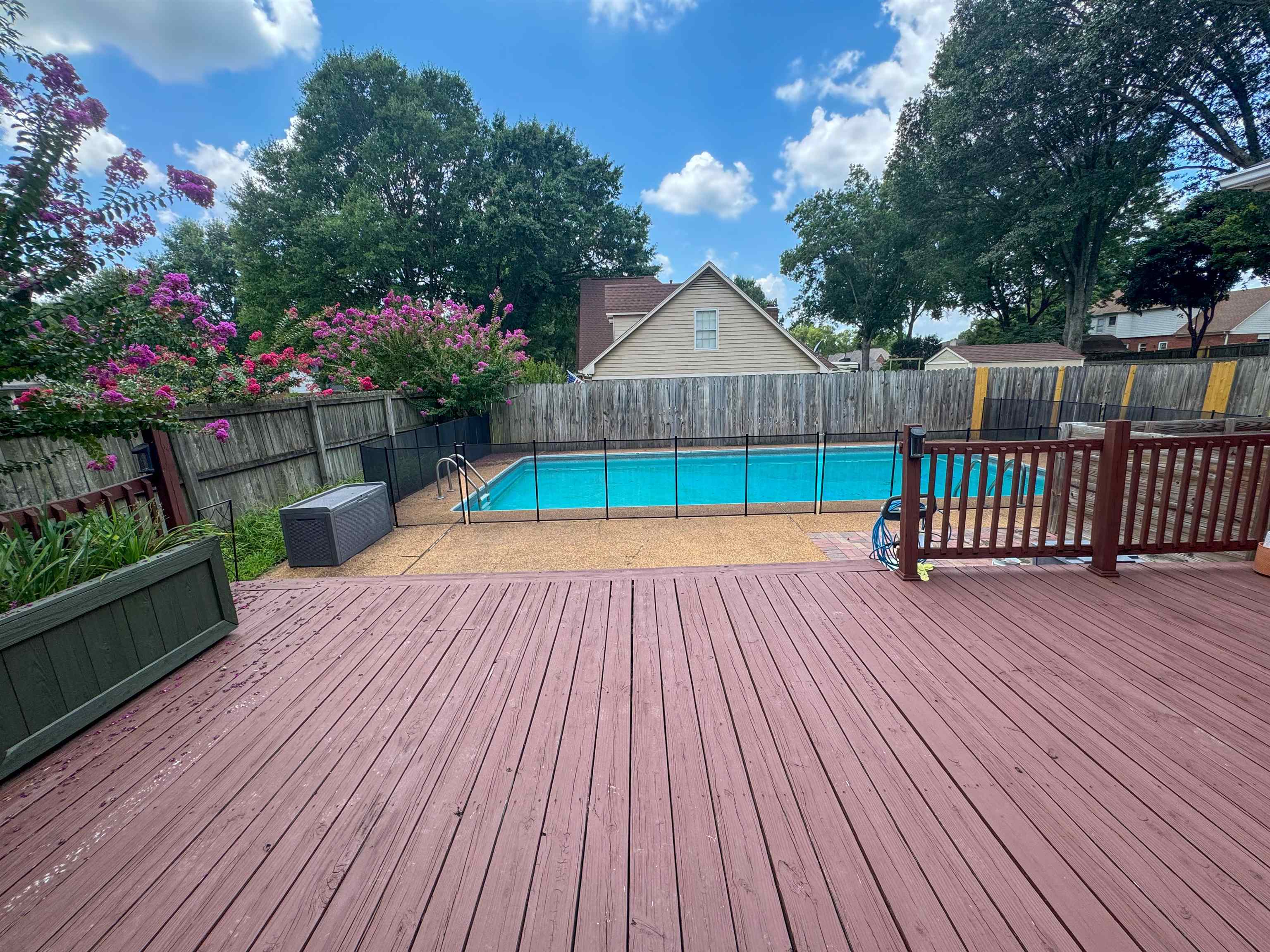 705 Cotham Drive Collierville, TN 38017 - Photo 2 of 22 a view of backyard with a deck and wooden floor