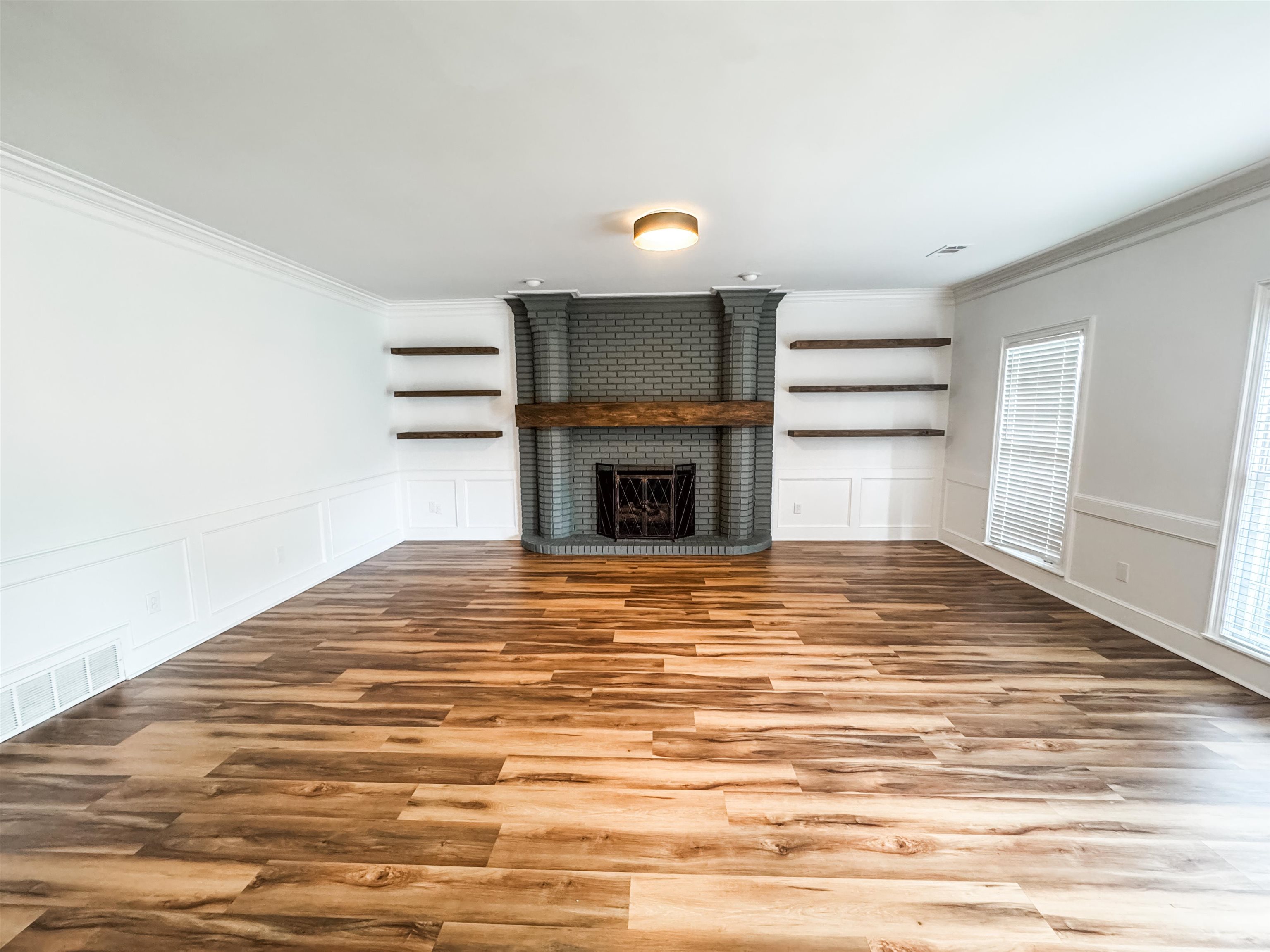 705 Cotham Drive Collierville, TN 38017 - Photo 6 of 22 a view of empty room with wooden floor