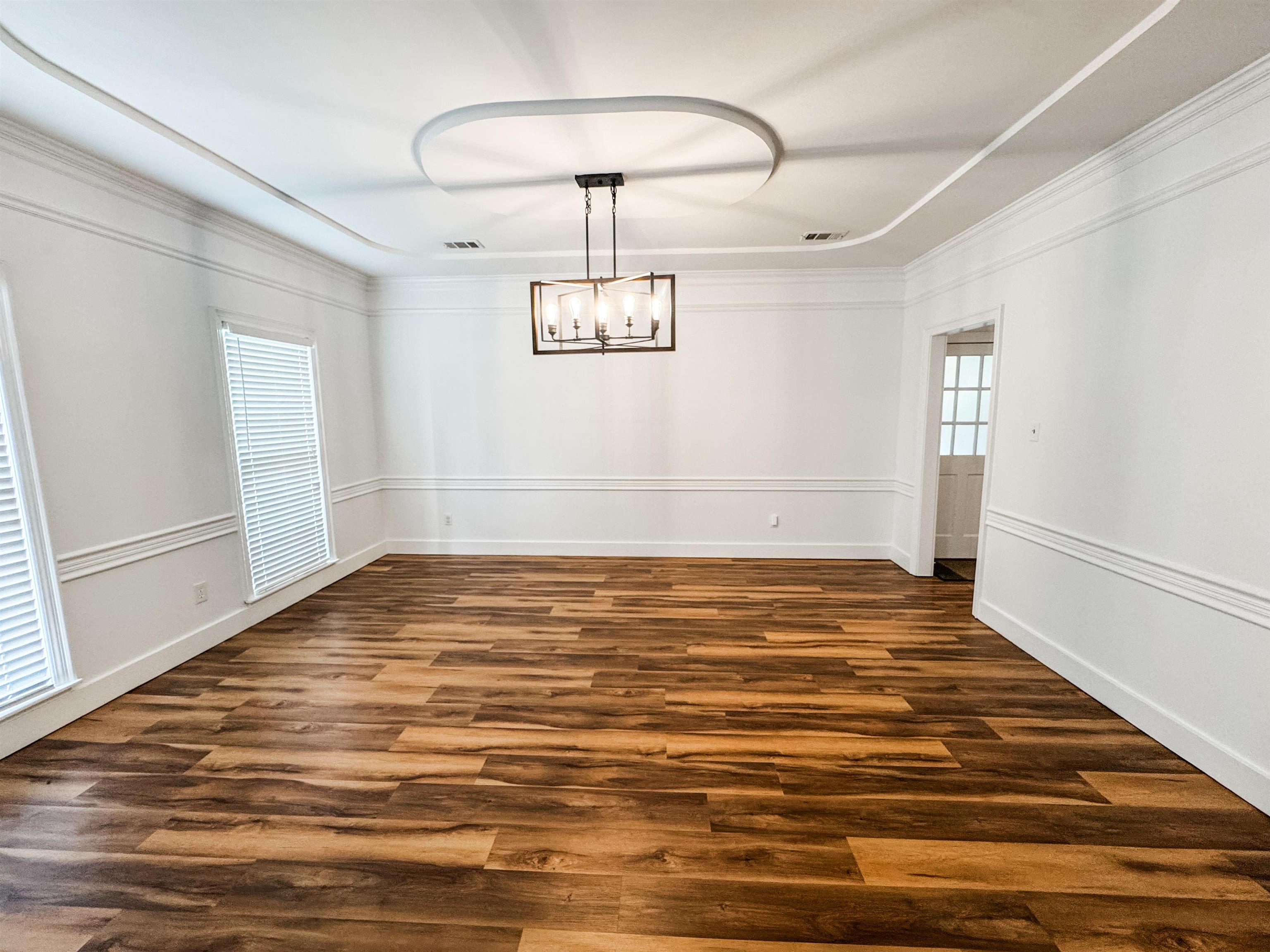 705 Cotham Drive Collierville, TN 38017 - Photo 8 of 22 a view of a room with window and wooden floor