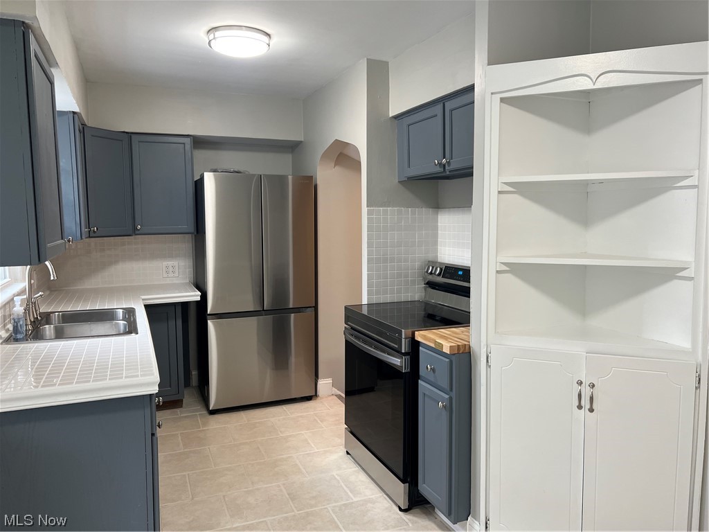 19003 Libby Road Maple Heights, OH 44137 - Photo 11 of 30 Updated kitchen w/built-in hutch.