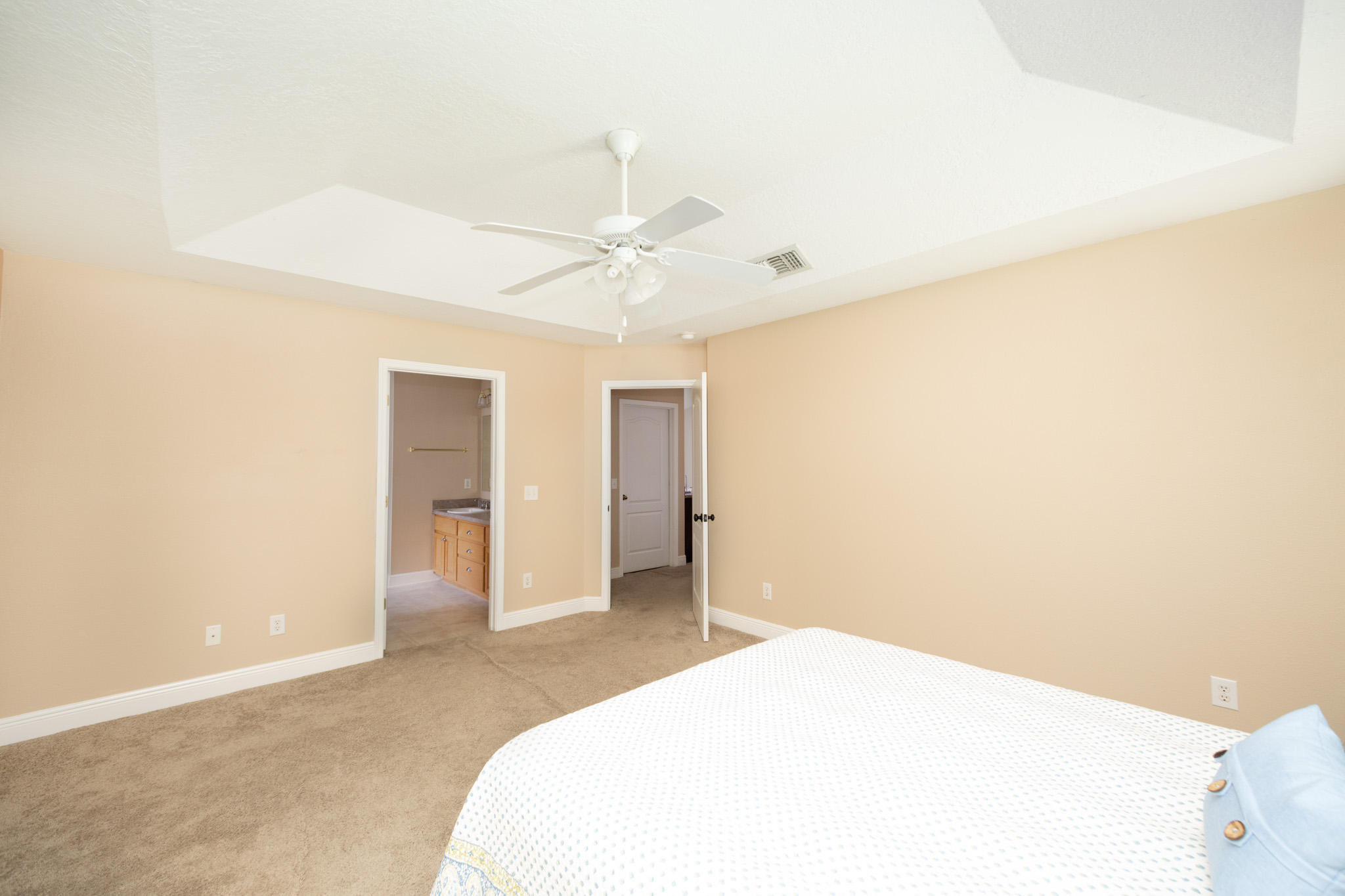 653 Territory Lane Crestview, FL 32536 - Photo 15 of 29 a bedroom with a bed and a ceiling fan