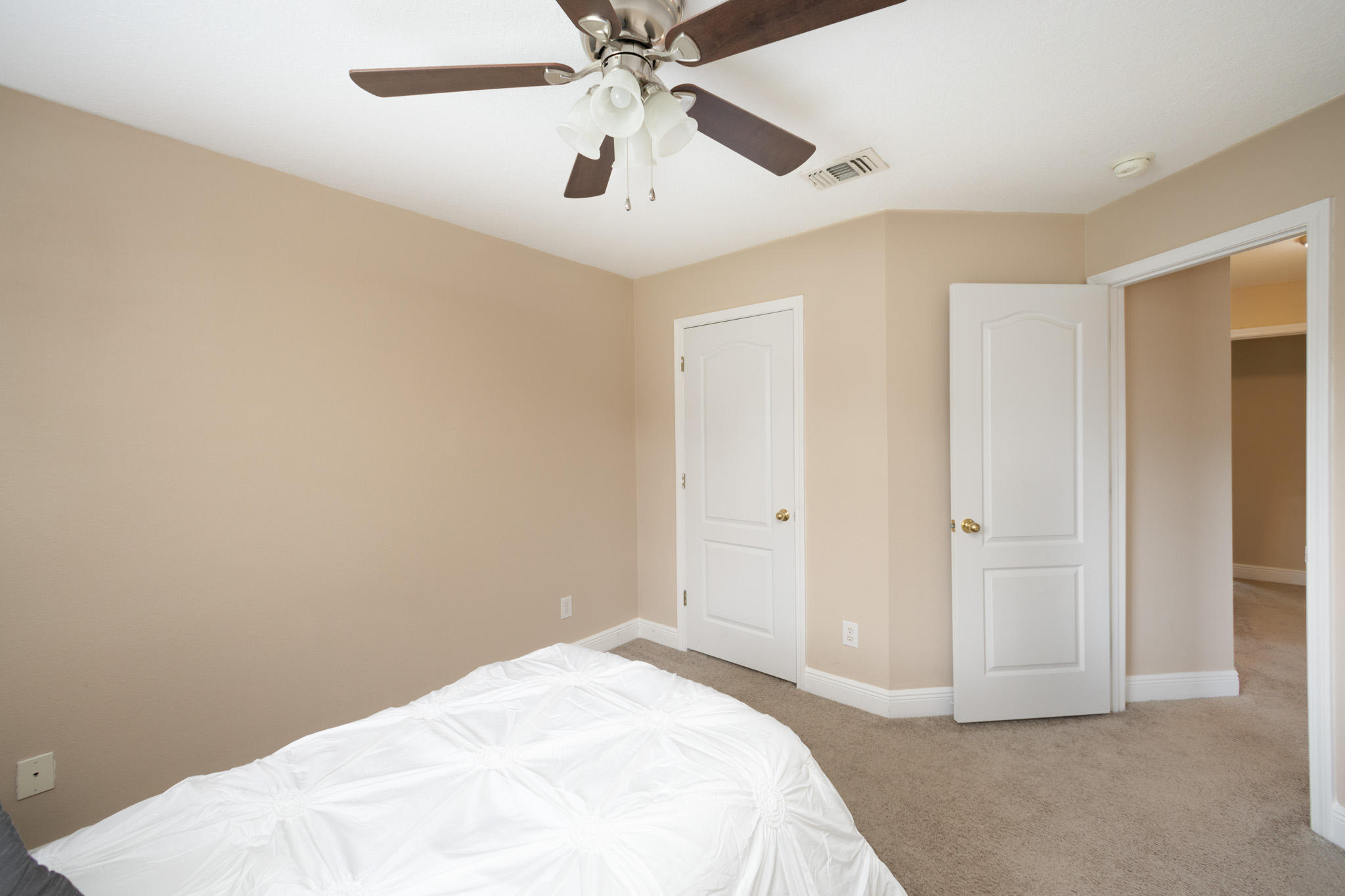 653 Territory Lane Crestview, FL 32536 - Photo 21 of 29 a bedroom with a bed and a ceiling fan
