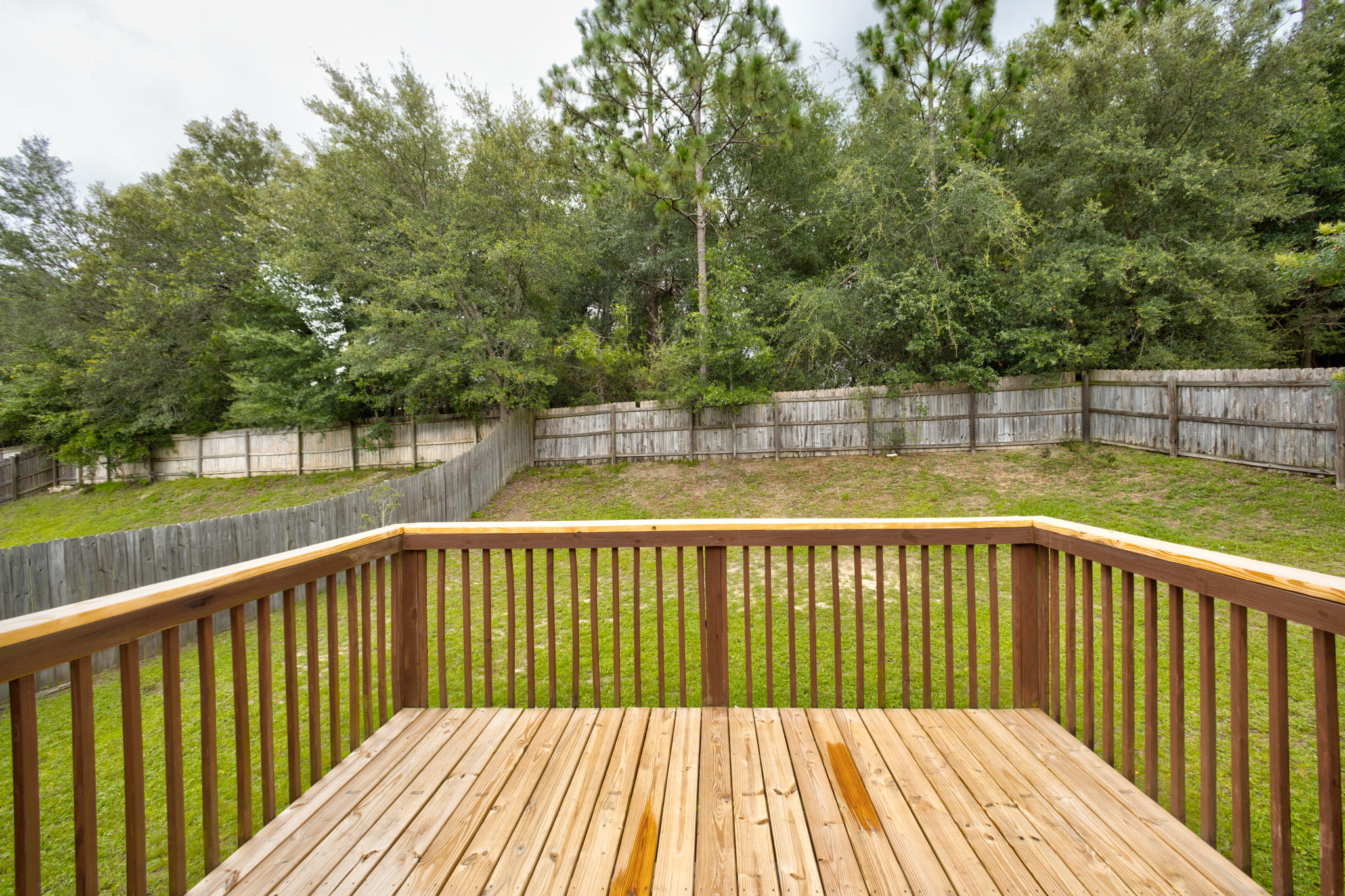 653 Territory Lane Crestview, FL 32536 - Photo 26 of 29 a view of wooden deck