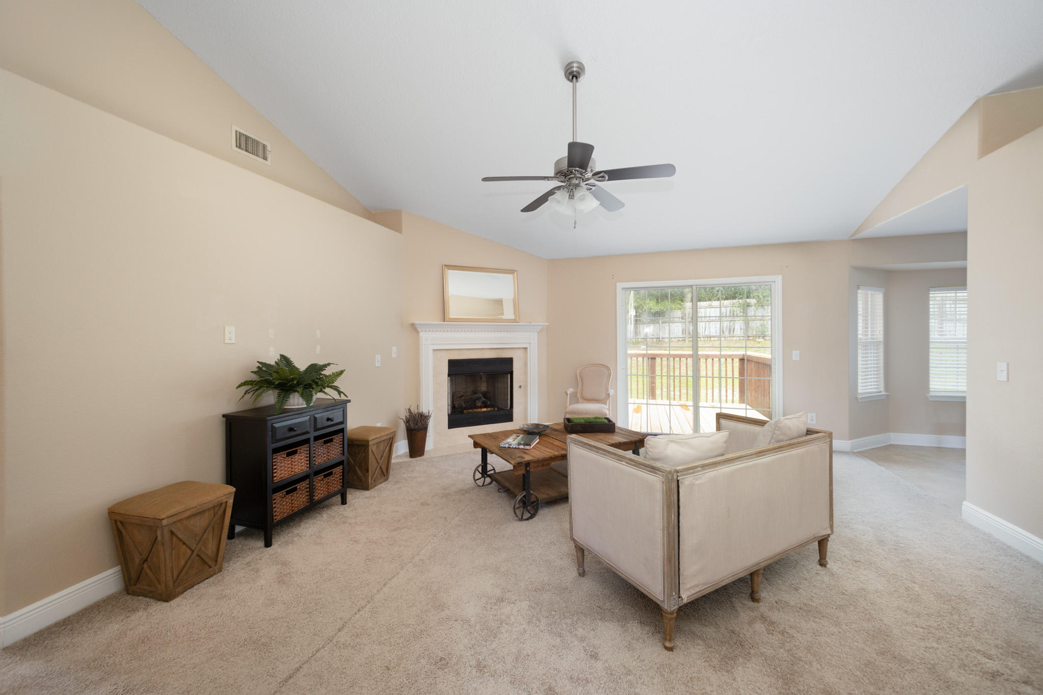 653 Territory Lane Crestview, FL 32536 - Photo 4 of 29 a living room with furniture fireplace and a window