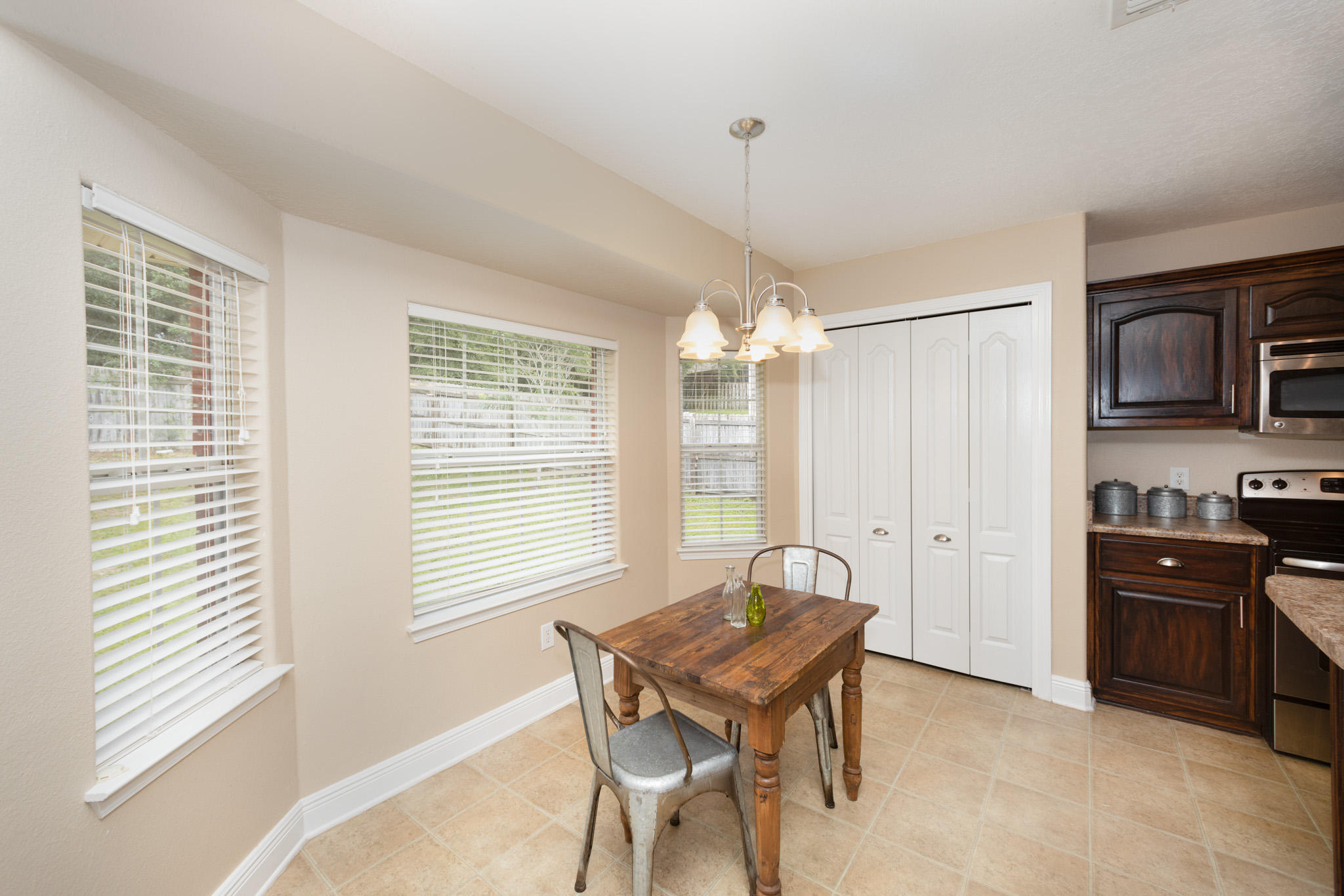 653 Territory Lane Crestview, FL 32536 - Photo 6 of 29 a view of a dining room with furniture and window