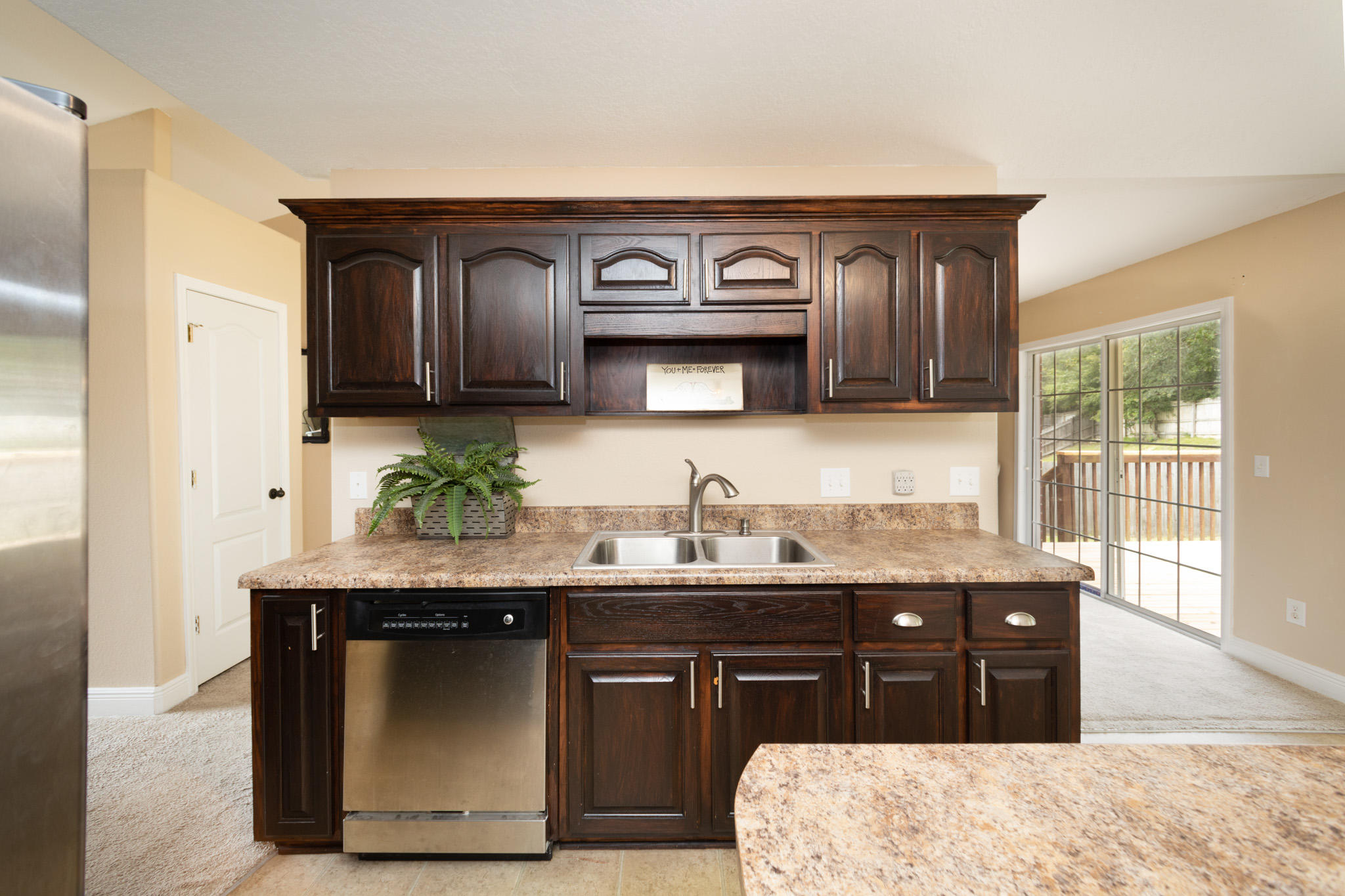 653 Territory Lane Crestview, FL 32536 - Photo 8 of 29 a spacious bathroom with a granite countertop sink and a mirror