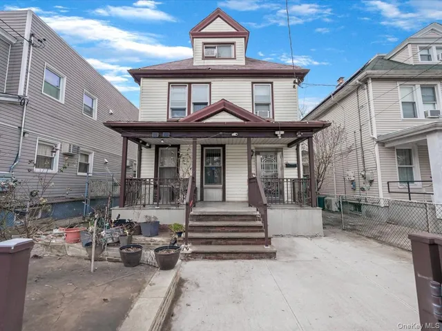 a front view of a house with a porch