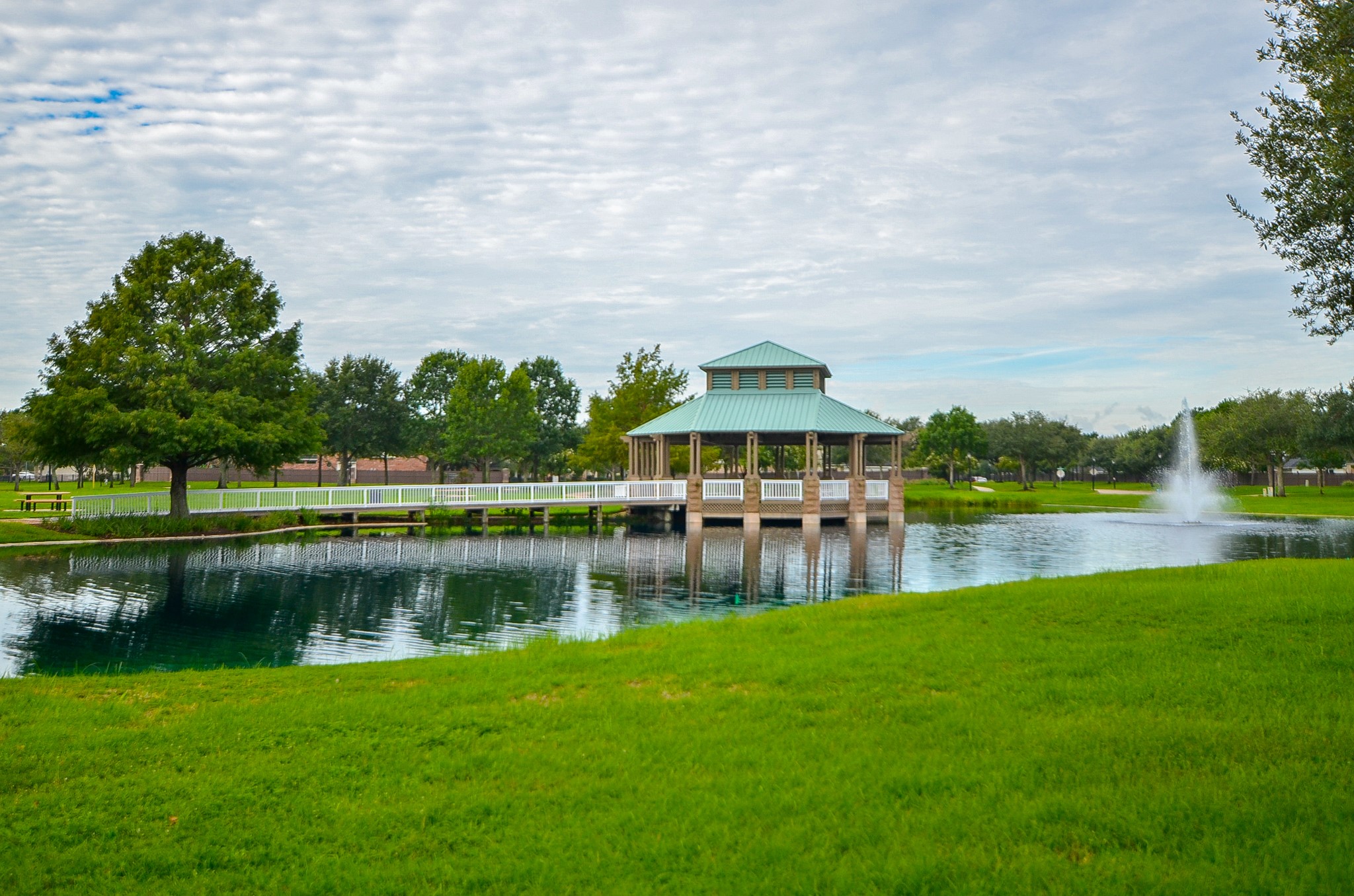 7218 Spring Run Lane Katy, TX 77494 - Photo 41 of 49 a view of a lake with houses in the background