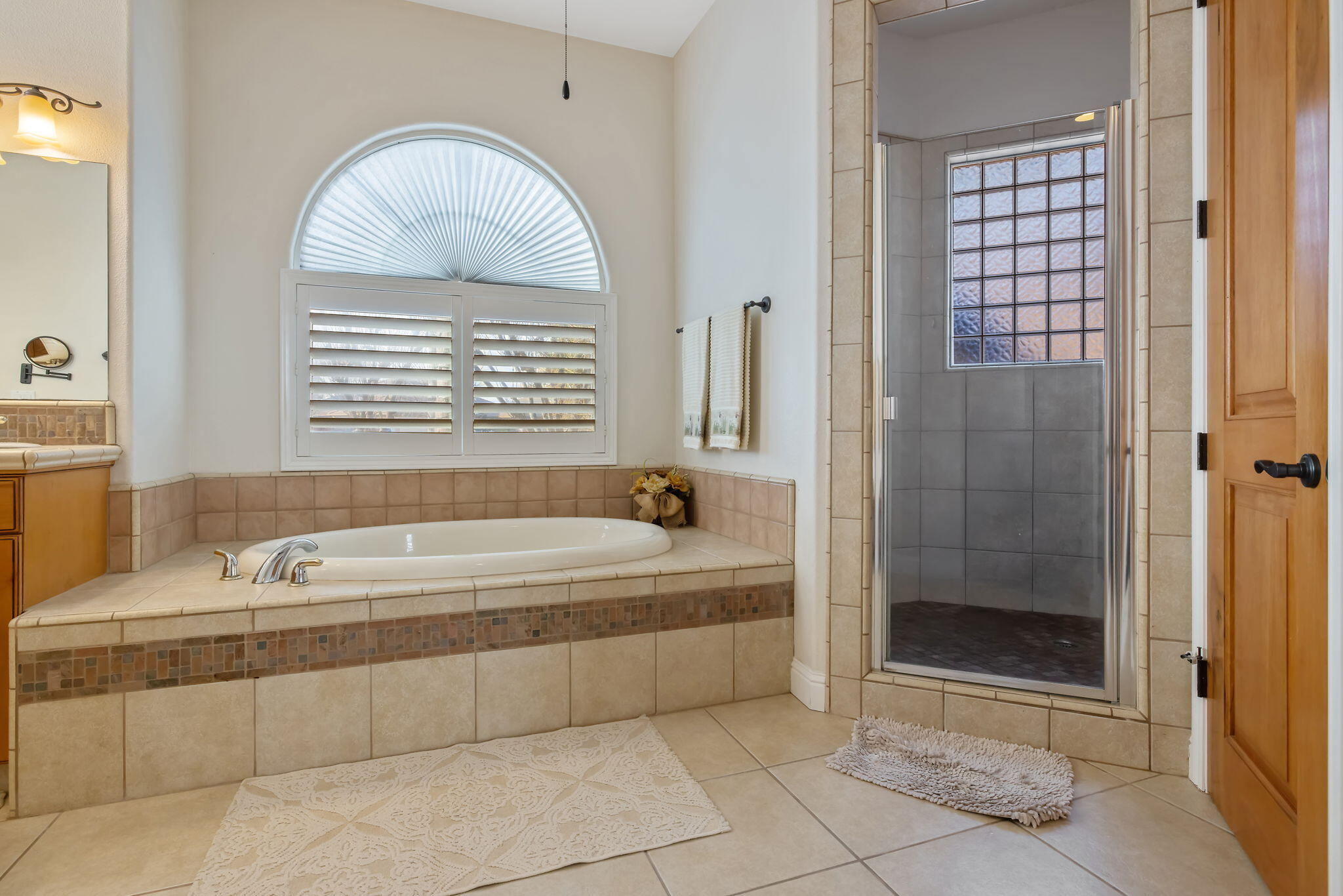 729 St Thomas Court Exeter, CA 93221 - Photo 36 of 66 a bathroom with a tub a potted plant and a shower